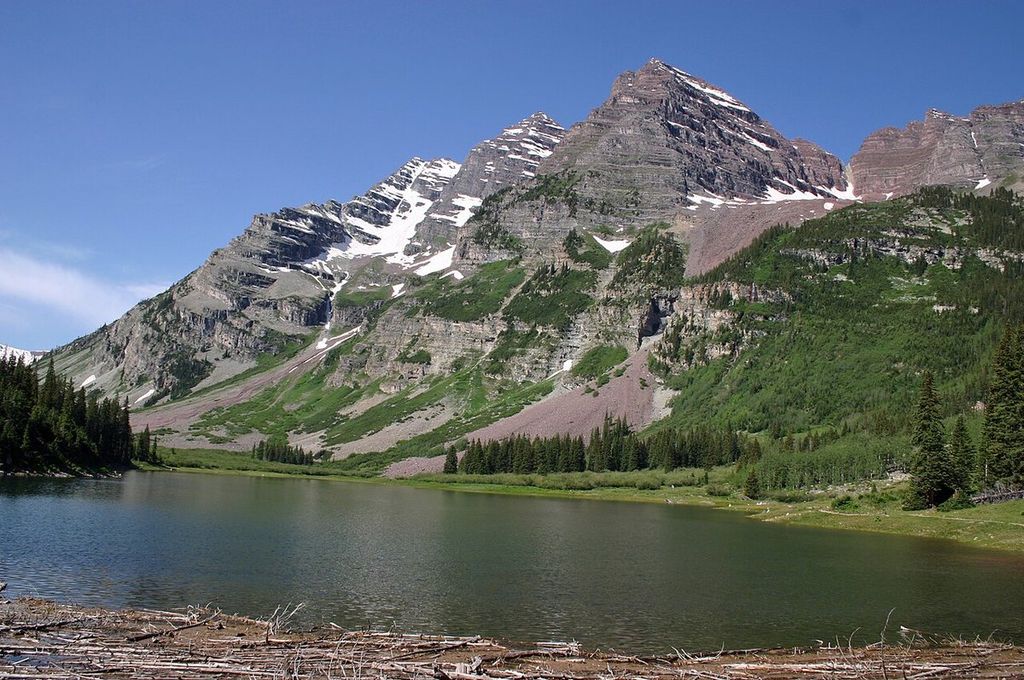 The Maroon Bells reflected in Maroon Lake in summer